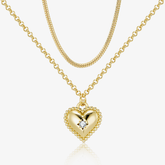 Gold layered rope, cable and chain set with heart pendant and embedded star gemstone