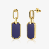 Vintage statement earrings with lapis-blue teardrop dangle and gold-tone frame.