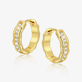 Gold hoop earrings with embedded stones on a white background