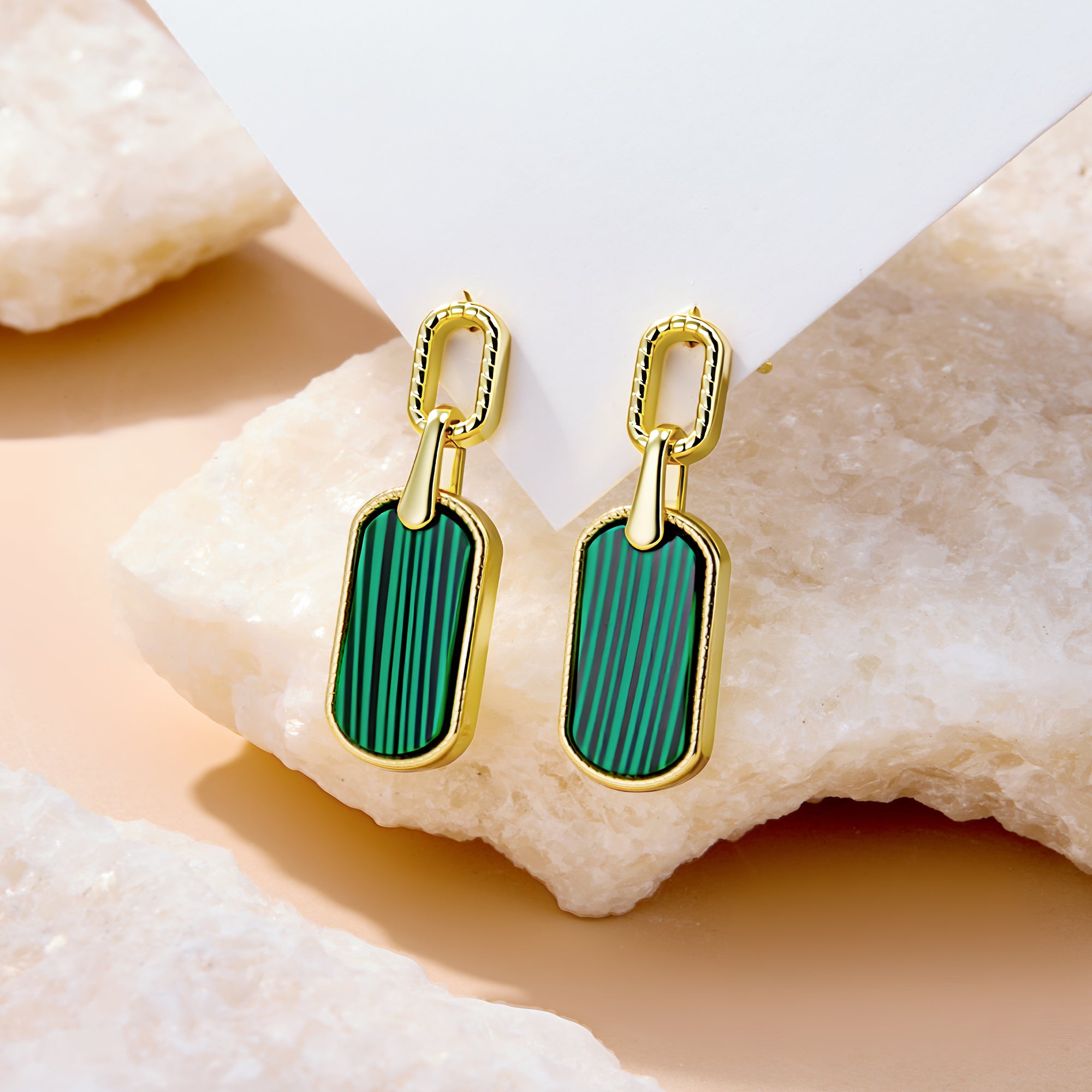Malachite green rectangular drop earrings with gold-tone bezel and textured hoops.