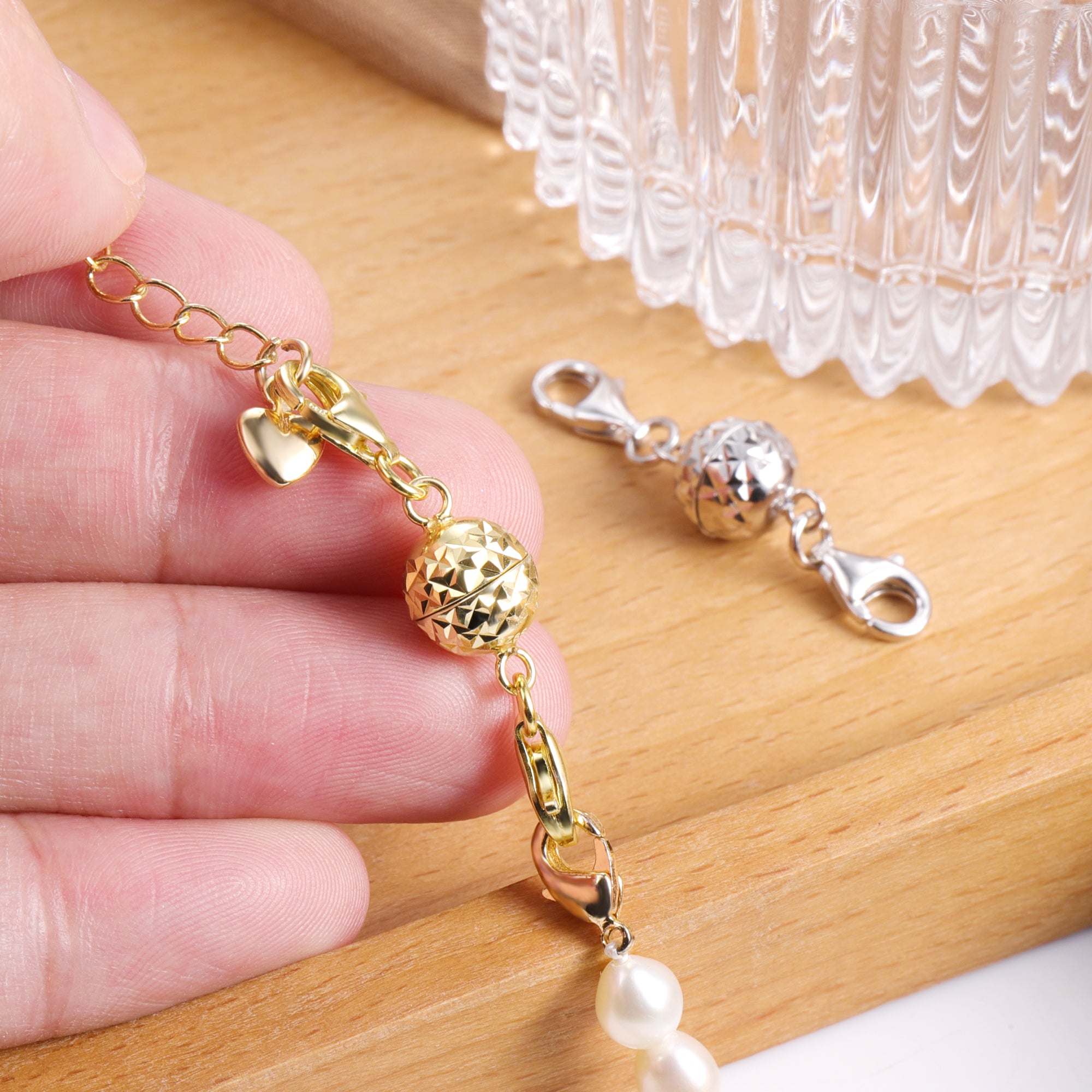 Gold magnetic clasp bracelet with faceted round disco bead and loop connector