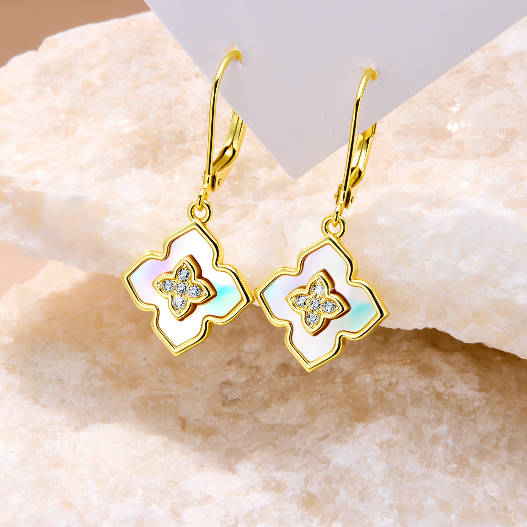 Four-leaf clover drop earrings in lapis lazuli blue enamel with crystal cross