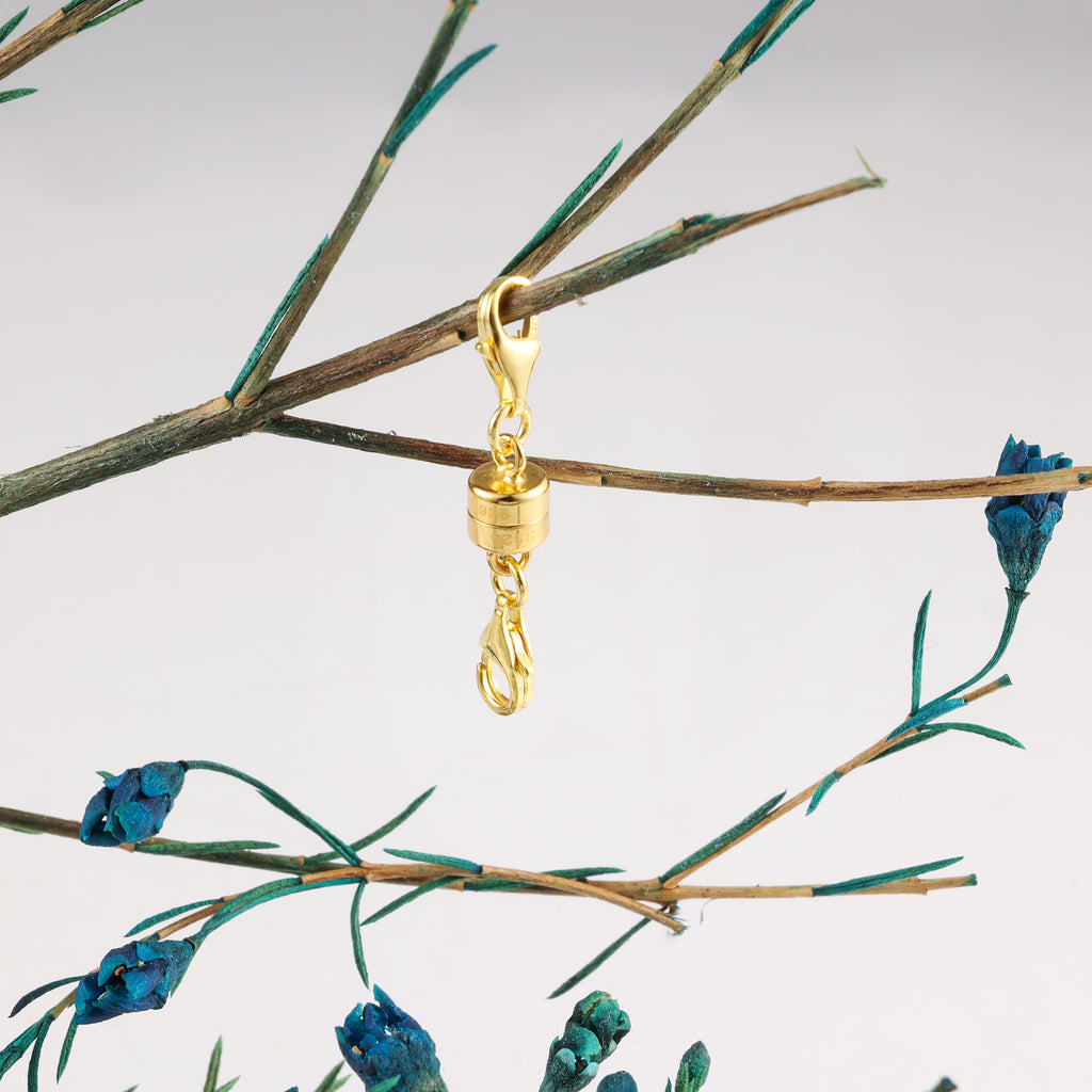 Gold magnetic clasp converter with swivel clasp and chain links, attached to necklace