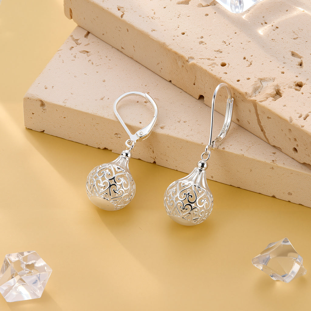 Silver hollow lantern drop earrings with engraved swirl lattice globe and hoop hooks