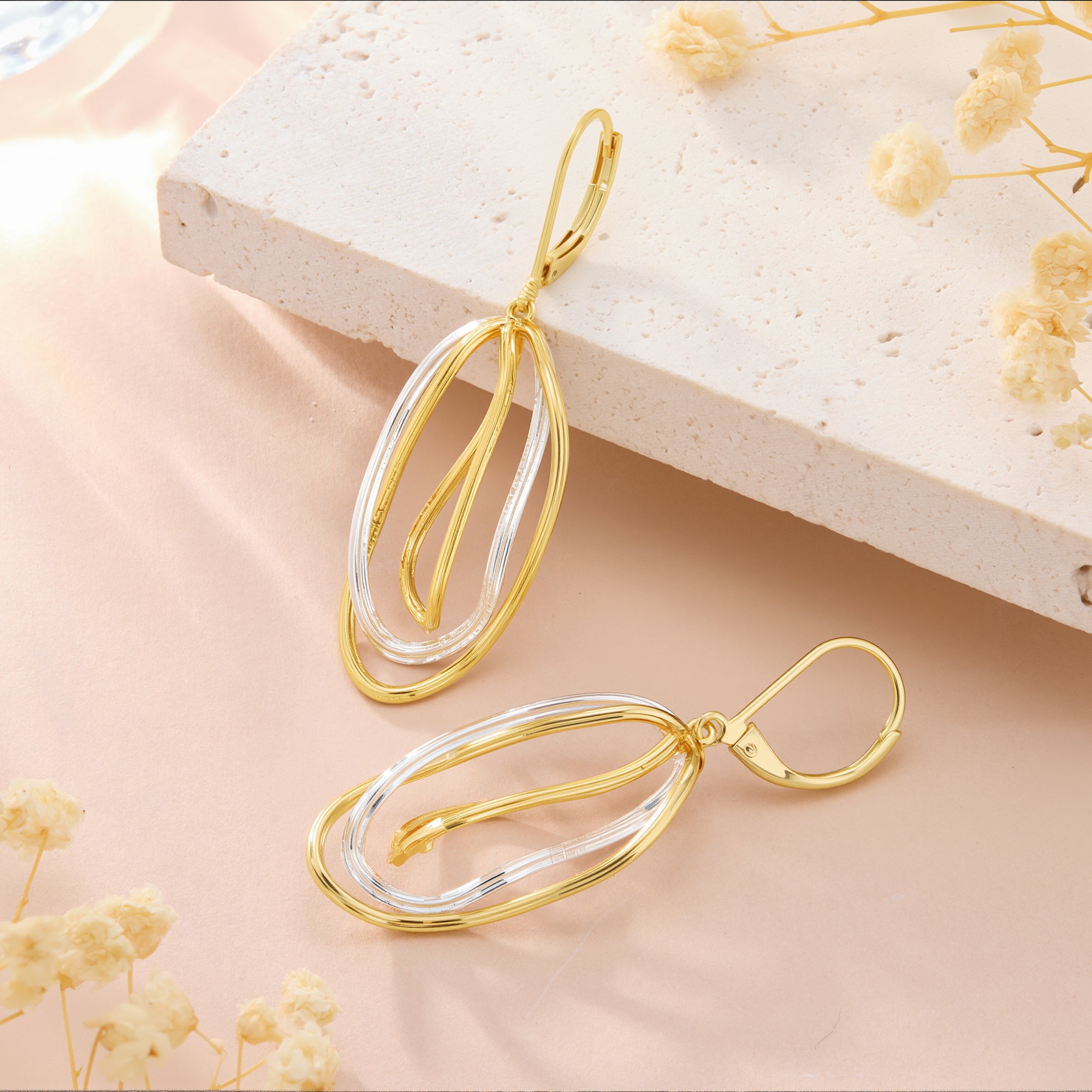Geometrische Tropfenohrringe in Gold und Silber, oval und geschwungen