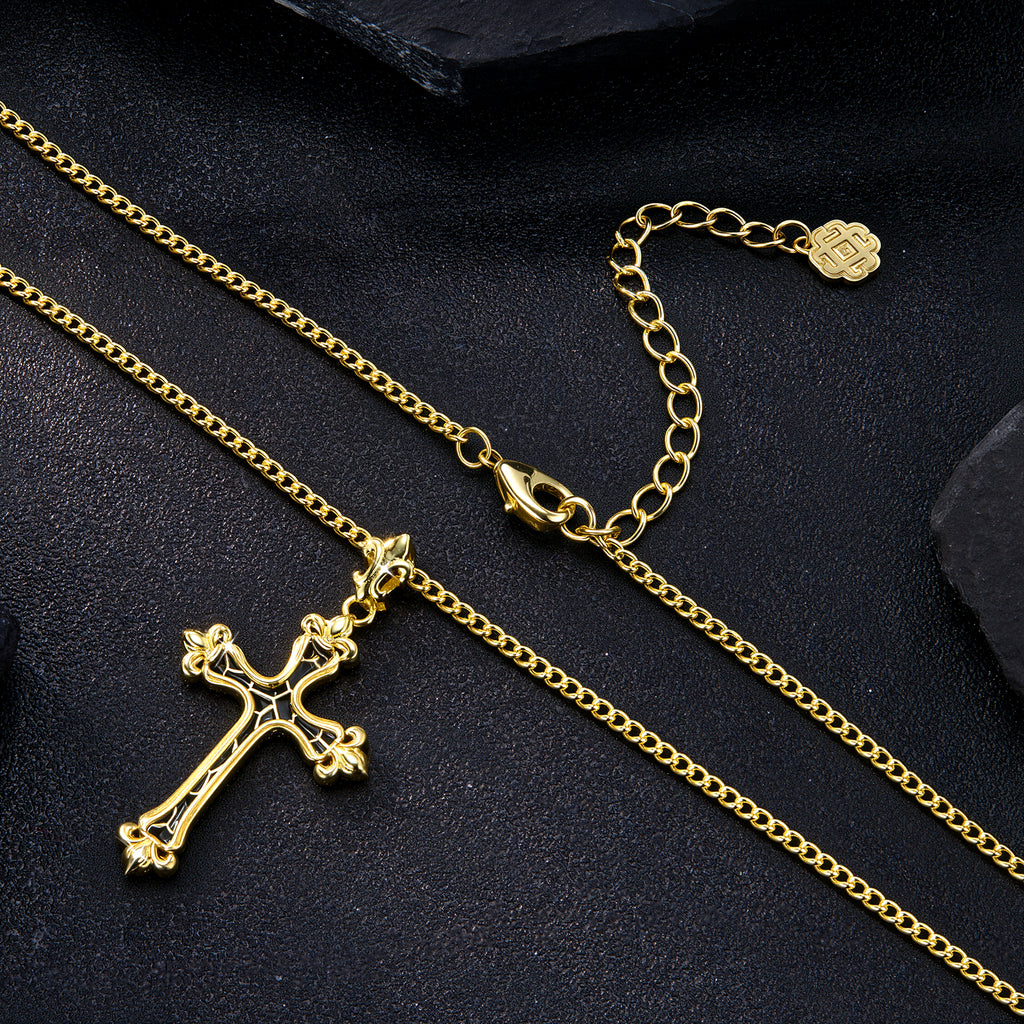 Gold cross necklace and clasp view; black-enamel cross pendant and knot charm