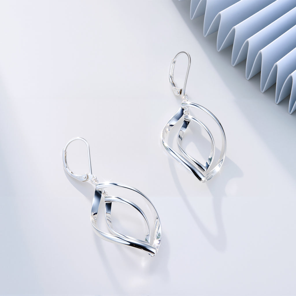 Silver Double Twist drop earrings, angled view of the nested teardrop loops