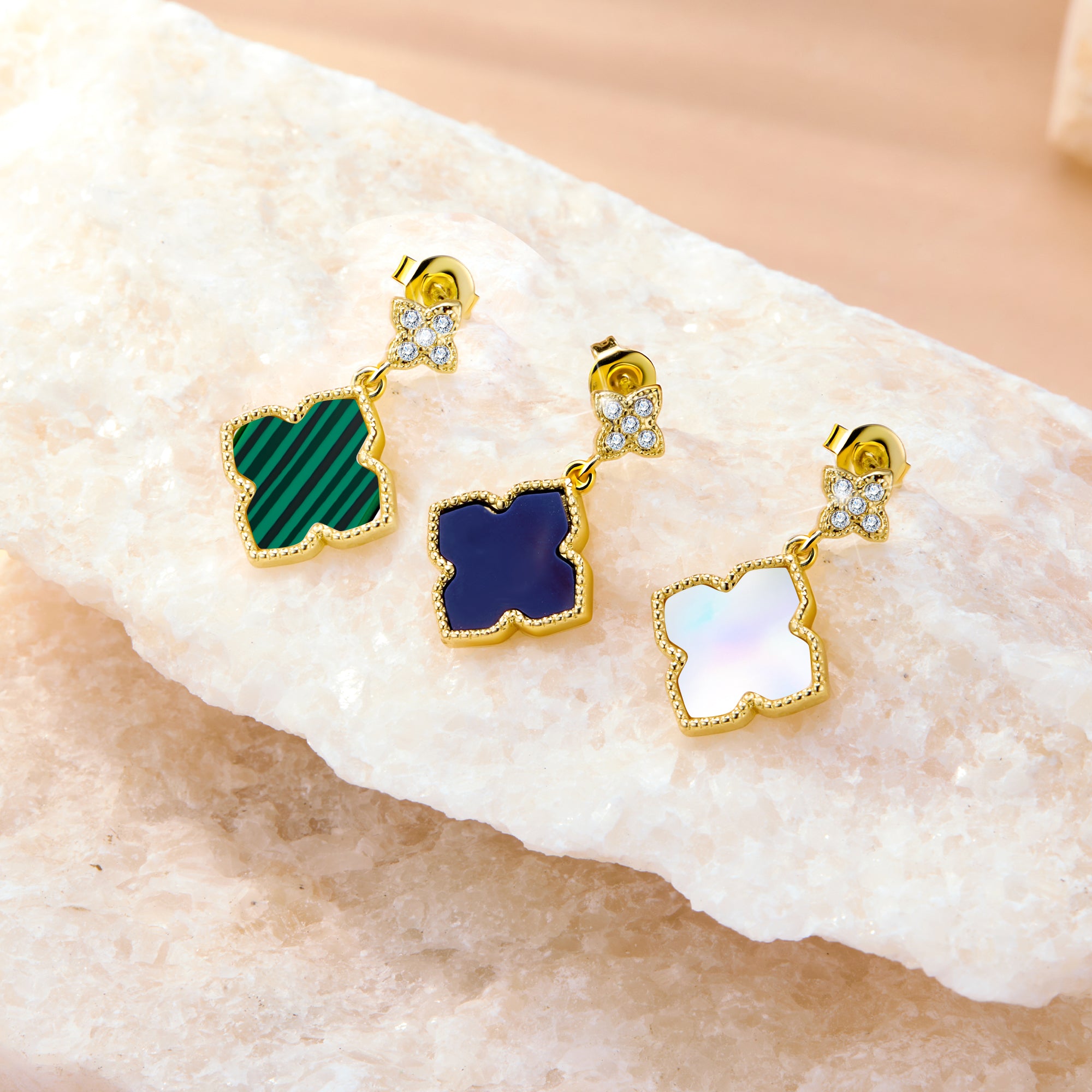 Four-Leaf Clover stud earrings set: green, blue, and pearl-shell enamel clovers on gold-tone