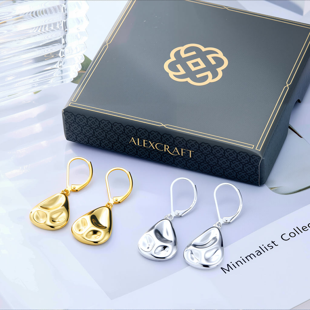 Set of hammered waterdrop earrings: gold and silver teardrop drops with lever hooks.