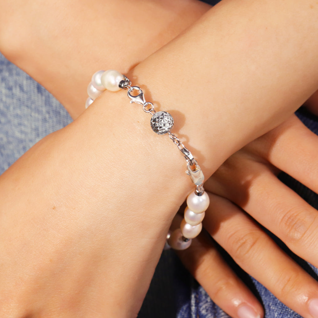 Silver disco ball magnetic clasp on pearl bracelet chain with faceted round bead