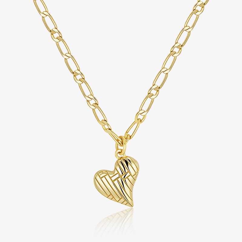 Gold Figaro heart pendant necklace with geometric textured heart charm