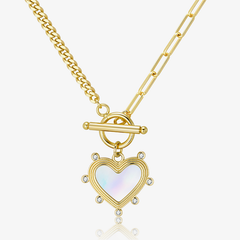 Gold heart pearl charm necklace with oval clasp and glittering stone details