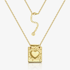 Gold heart locket necklace with textured square pendant and inset heart, fine chain links.