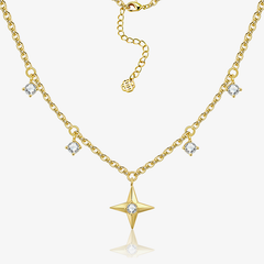 Gold-tone chain necklace with central star pendant, zircon accents, and small charm links
